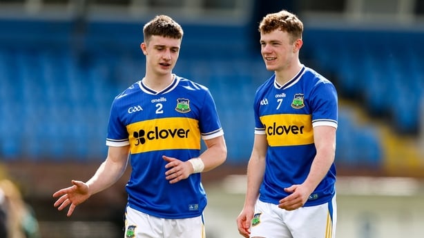12 April 2026; Tipperary players, from left, Jack O'Neill and Charlie King after their side's victory in the Munster GAA Football Senior Championship quarter-final match between Waterford and Tipperary at Cappoquin Logistics Fraher Field in Waterford. Photo by Michael P Ryan/Sportsfile