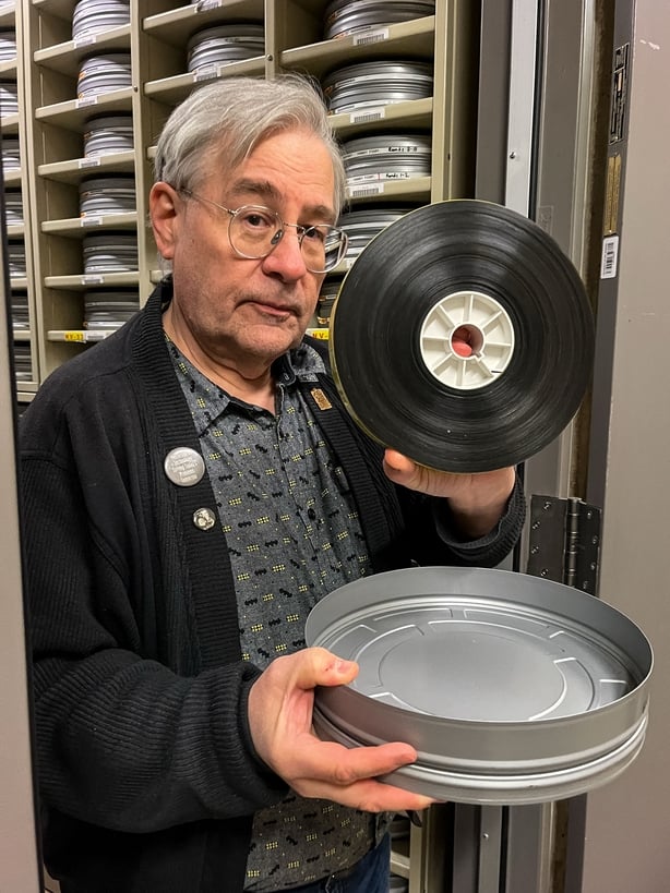 Nitrate Film Vault leader George Willeman holds up film as he explains how the different functions of the vault work at the Packard Campus of the Library of Congress's National Audio-Visual Conservation Center in Culpeper, Virginia, on 2 April, 2026. (Photo by KENT NISHIMURA / AFP)