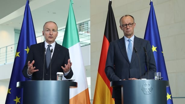 Taoiseach Micheál Martin and German Chancellor Friedrich Merz speak to the media following talks at the Chancellery in Berlin