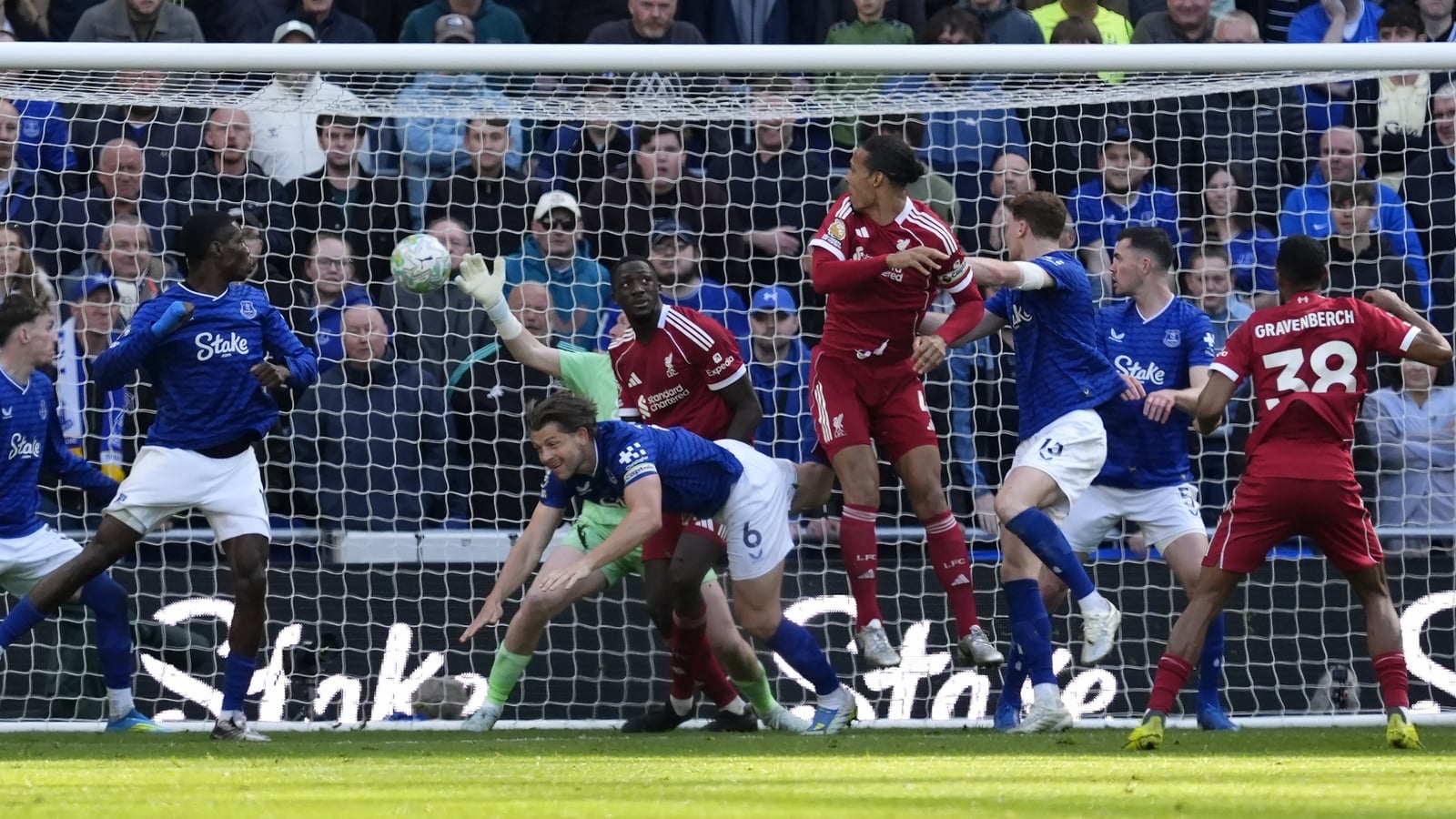 Van Dijk header earns Liverpool injury-time derby win
