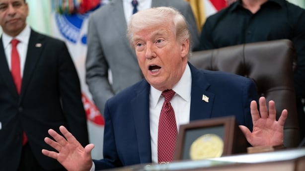 WASHINGTON, DC - APRIL 18: U.S. President Donald Trump makes an announcement on researching the effects of psychedelic drugs in medical treatment for veterans, on Saturday, April 18, 2026 in the Oval Office at the White House in Washington, D.C. HHS Secretary Robert F. Kennedy Jr., podcast host Joe 