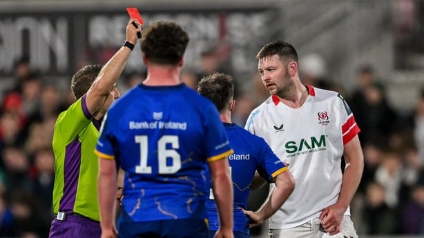 17 April 2026; Referee Andrew Brace shows a red card to Max Deegan of Leinster, not pictured, during the United Rugby Championship match between Ulster and Leinster at Affidea Stadium in Belfast. Photo by Ramsey Cardy/Sportsfile
