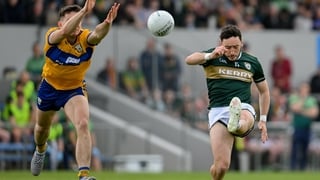 Paudie Clifford of Kerry kicks a point during the Munster GAA Football Senior Championship semi-final match between Kerry and Clare at Zimmer Biomet Páirc Chíosóg in Ennis, Clare.