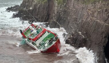 Operation to salvage trawler grounded 'in awkward spot'
