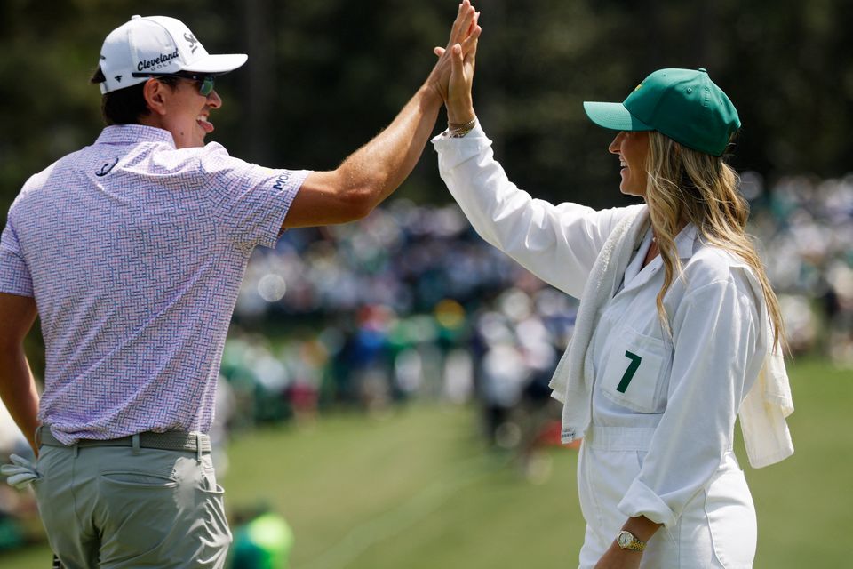 Golf - The Masters - Augusta National Golf Club, Augusta, Georgia, U.S. - April 8, 2026
Colombia's Nicolas Echavarria celebrates with his wife Claudia De Antonio during the par 3 contest REUTERS/Brian Snyder