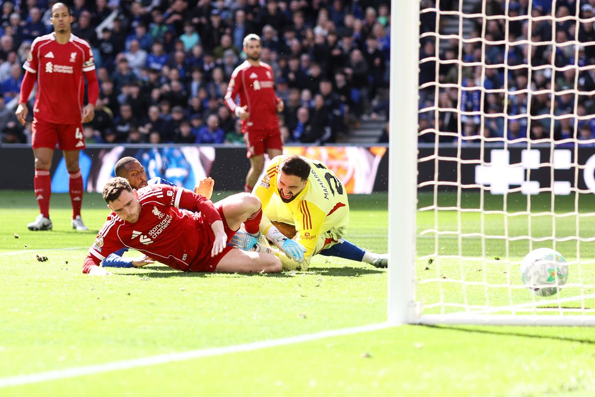Beto of Everton scores their first goal past Liverpool goalkeeper Giorgi Mamardashvili 