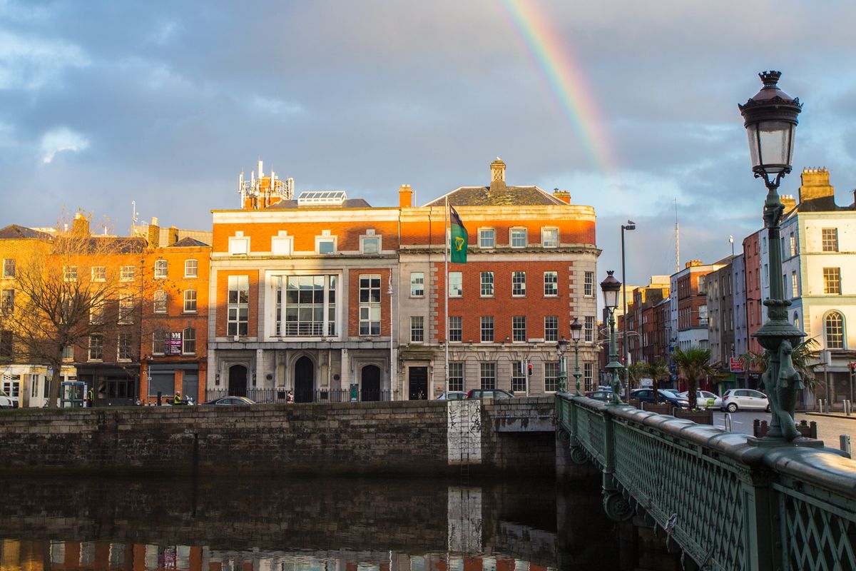 A rainbow over the quays during the early morning in Dublin City, Ireland