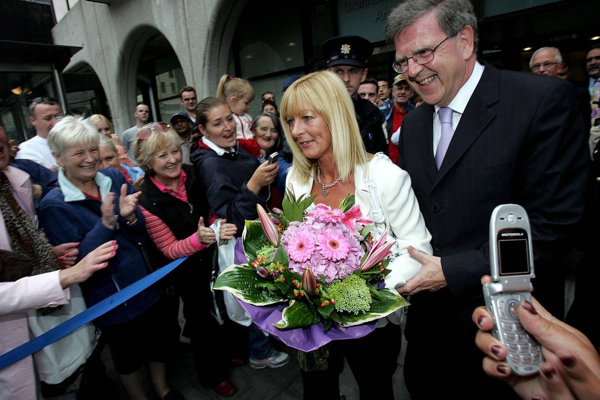Dolores McNamara leaves the Irish National Lottery Headquarters in Dublin