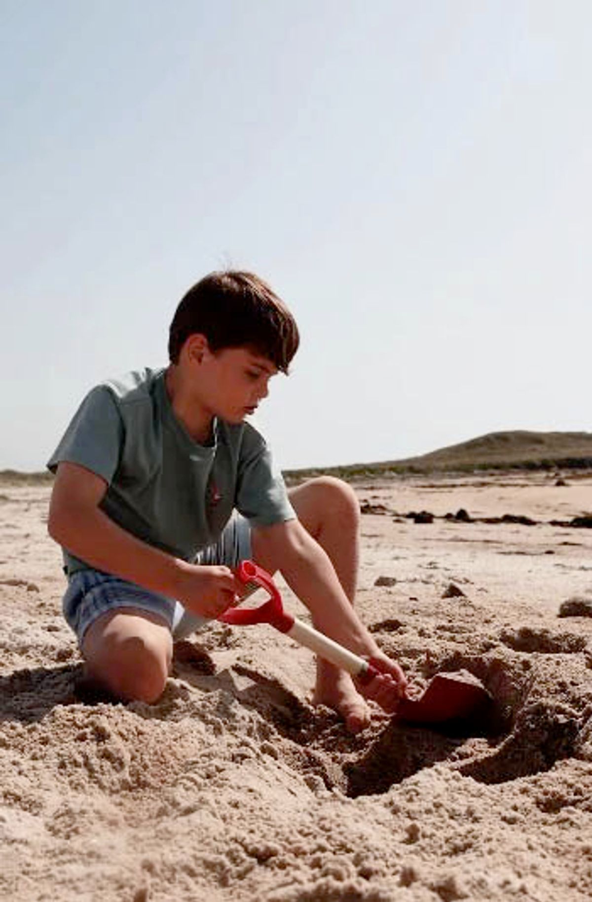 Louis plays on the sand