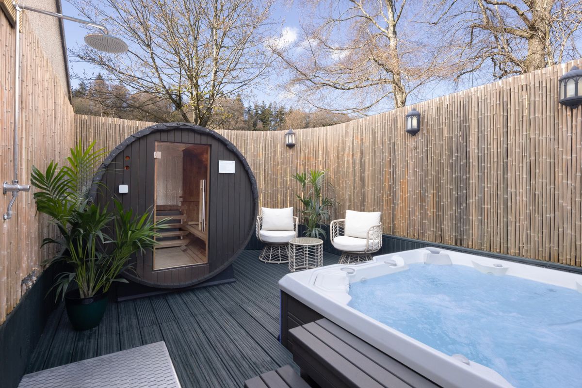 Facilities also include an outdoor hot tub and sauna