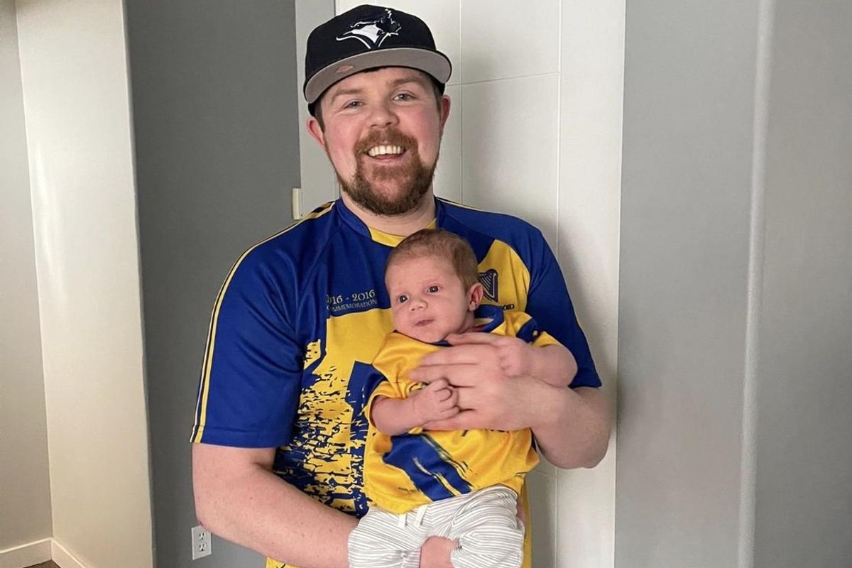Charlie Beirne with his two-year-old son, Shea