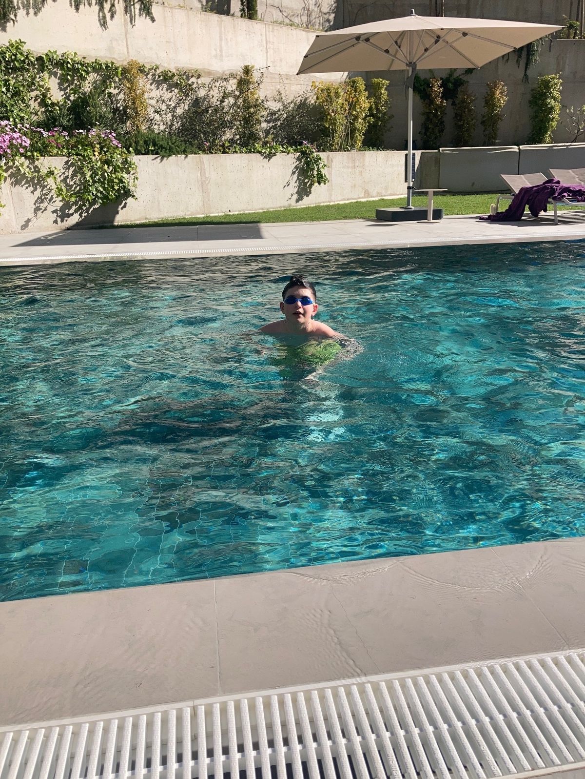 Maura shared a snap of her son in the pool
