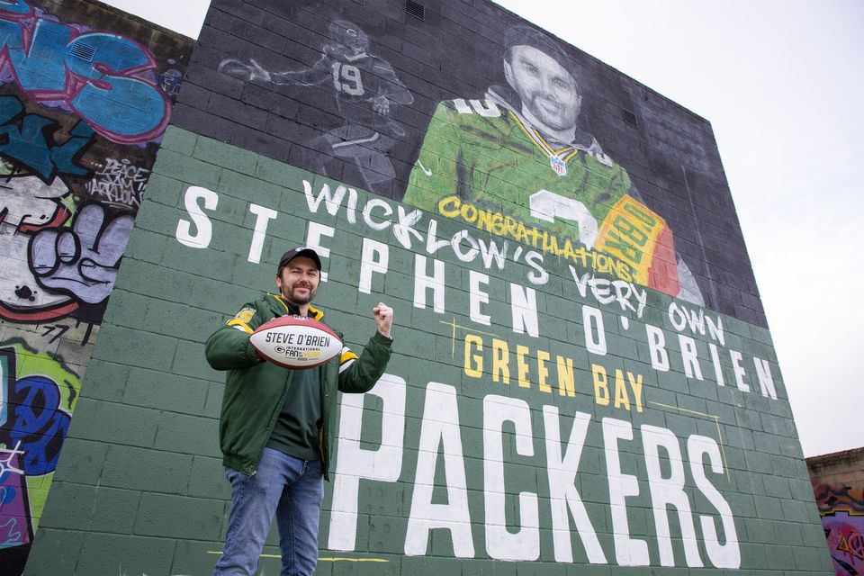 Green Bay Packers' International Fan of the Year 2025 Stephen O'Brien pictured next to his mural at the Arklow Coral Leisure Centre. Photo: Michael Kelly