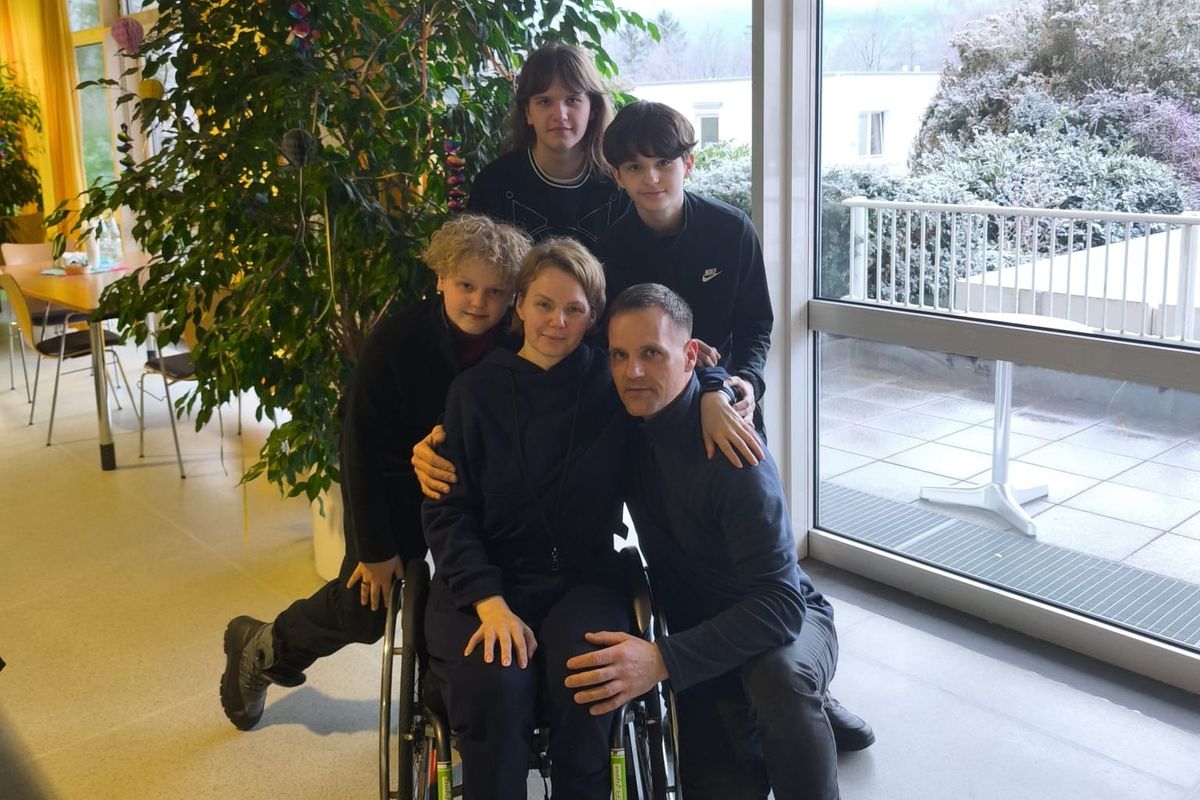 Margarita Strazinska with her husband and three sons following her life-changing injury