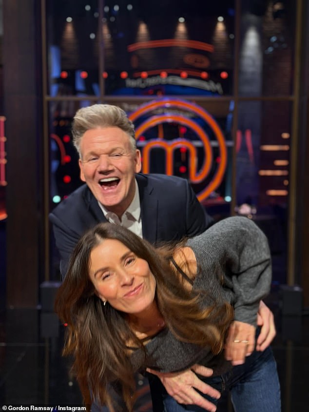 Tana looked delighted to be visiting her husband of 29 years at work, smiling as he kissed and cuddled her