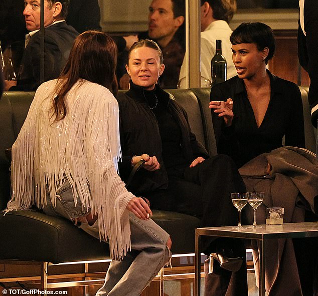 The reality star and jewellery brand owner was spotted having an animated conversation with Idris Elba's wife Sabrina over wine and cigarettes at Dorian Notting Hill