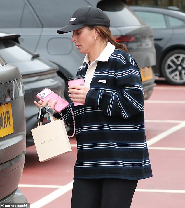 Coleen kept a low profile for the outing as she stepped out in a Celine cap and sipped on a drink from Joe & The Juice