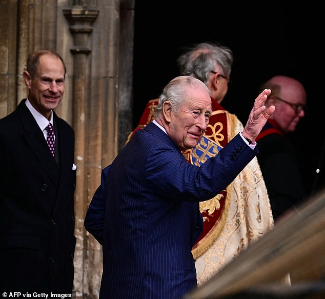 King Charles III (pictured) waved as he arrives with members of his family at St George's Chapel, in Windsor