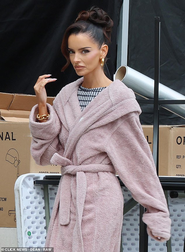 The TV personality, 35, who recently blamed her 'changing' face on 'make-up and lighting', arrived on set in London ready to film in full glam