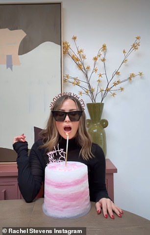 Turning to the other side, Rachel was given a pair of black sunglasses