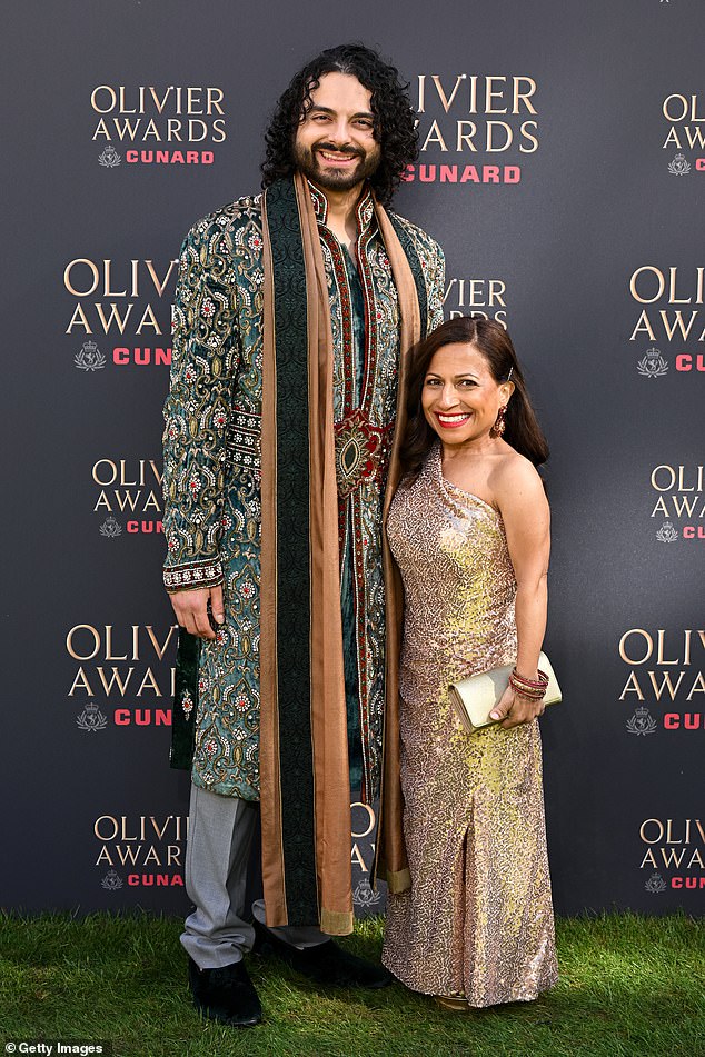 Paddington stars' James Hameed and Arti Shah beamed as they posed for a photo.