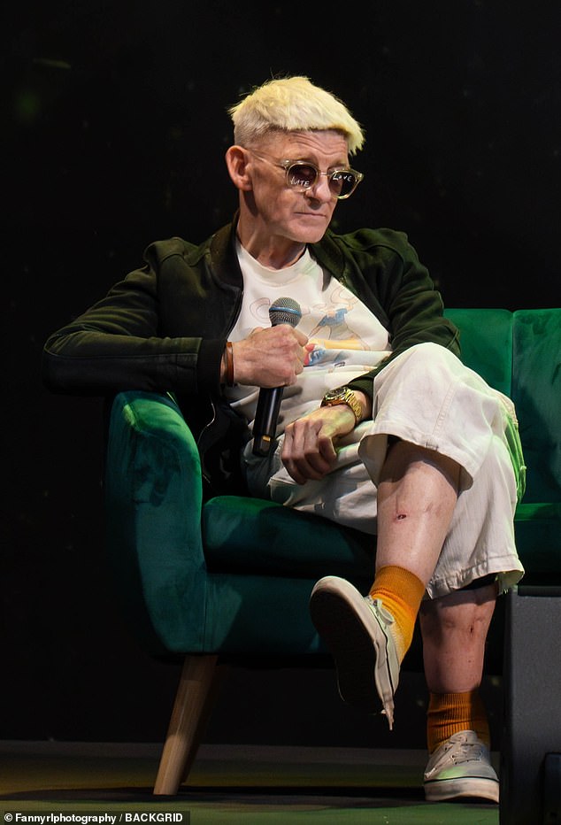 Anderson was seen giving a talk on stage wearing a pair of cropped jeans - which exposed a series of cuts on his legs