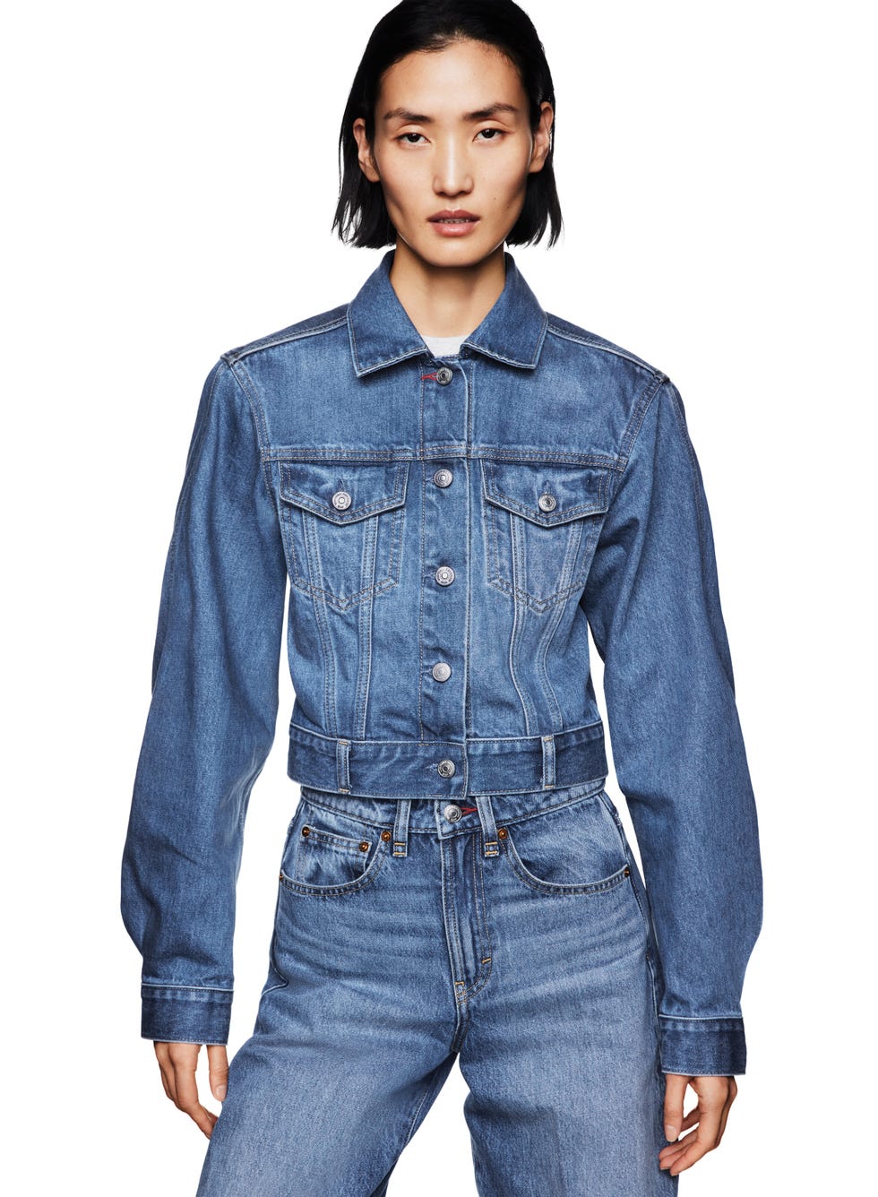 denim jacket worn with matching jeans