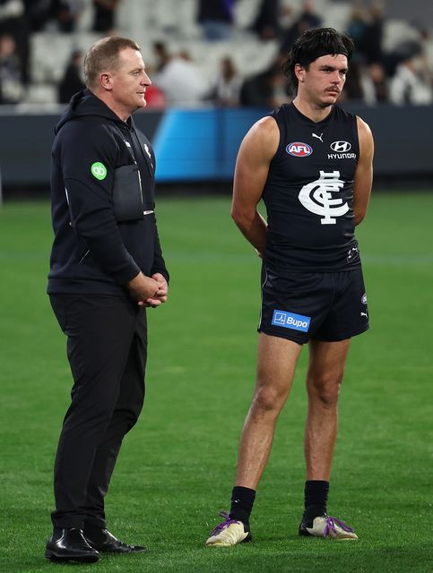 Michael Voss (senior coach Carlton Blues) and Elijah Hollands after the game against Collingwood Magpies in Melbourne, Australia last Thursday. Photo: James Wiltshire/AFL Photos via Getty Images