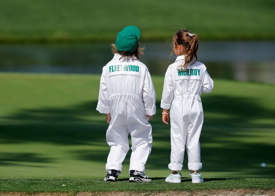 Golf - The Masters - Augusta National Golf Club, Augusta, Georgia, U.S. - April 8, 2026
England's Tommy Fleetwood's son Frankie and Northern Ireland's Rory McIlroy's daughter Poppy during the par 3 contest REUTERS/Mike Blake