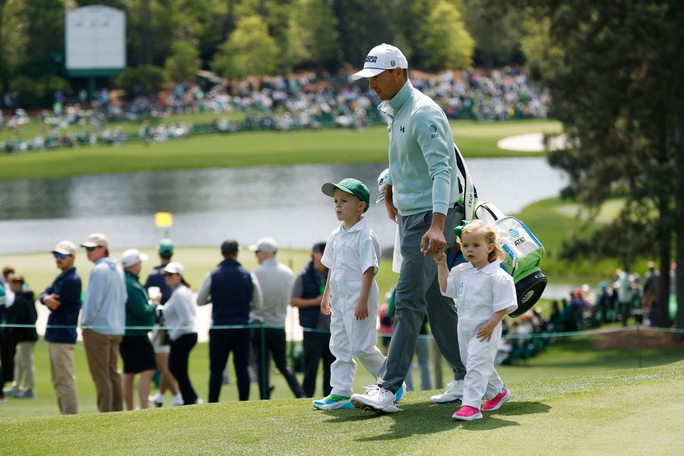 Golf - The Masters - Augusta National Golf Club, Augusta, Georgia, U.S. - April 8, 2026
Jordan Spieth of the U.S. with his children Sammy and Sophie on the 2nd hole during the par 3 contest REUTERS/Brian Snyder