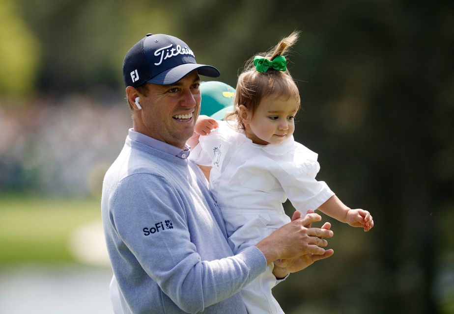 Golf - The Masters - Augusta National Golf Club, Augusta, Georgia, U.S. - April 8, 2026
Justin Thomas of the U.S. with his daughter Molly Thomas on the 2nd hole during the par 3 contest REUTERS/Brian Snyder