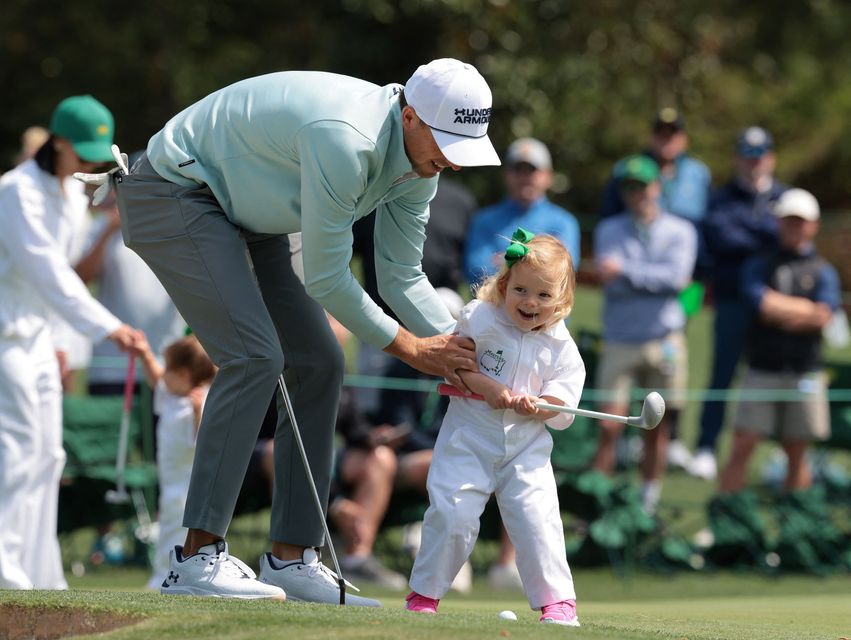 Golf - The Masters - Augusta National Golf Club, Augusta, Georgia, U.S. - April 8, 2026
Jordan Spieth of the U.S. with his daughter Sophie on the 3rd hole during the par 3 contest REUTERS/Kylie Cooper