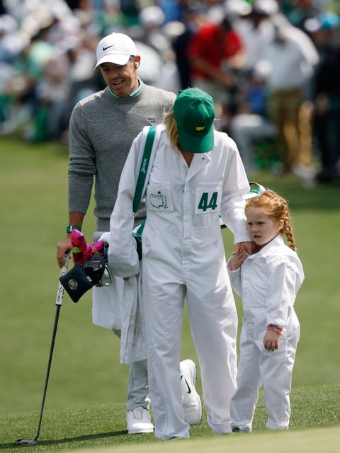 Golf - The Masters - Augusta National Golf Club, Augusta, Georgia, U.S. - April 8, 2026
Northern Ireland's Rory McIlroy with Ireland's Shane Lowry's wife Wendy Lowry and daughter Ivy Lowry on the green of the 2nd hole during the par 3 contest