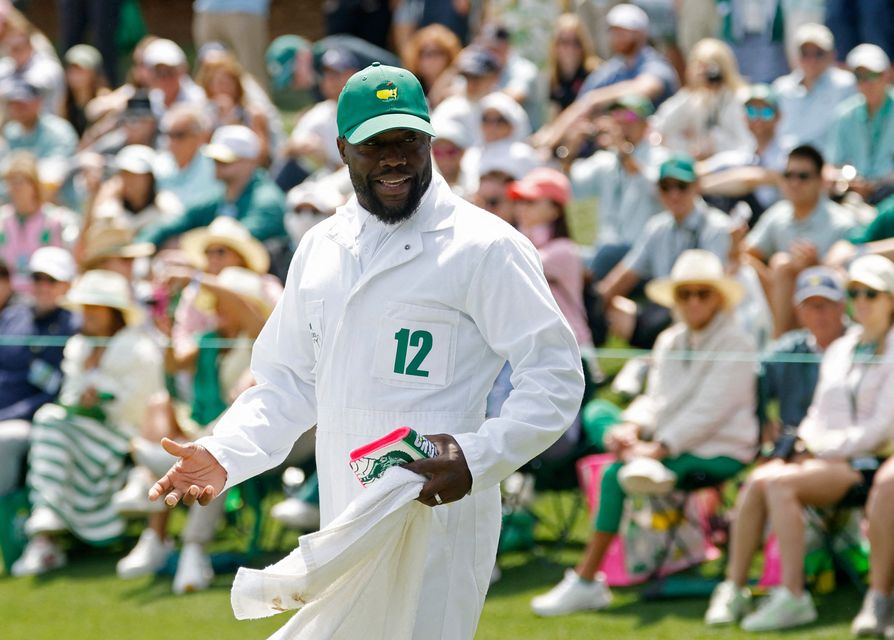 Golf - The Masters - Augusta National Golf Club, Augusta, Georgia, U.S. - April 8, 2026
Actor and comedian Kevin Hart, caddie for Bryson DeChambeau of the U.S., on the 2nd hole during the par 3 contest REUTERS/Brian Snyder