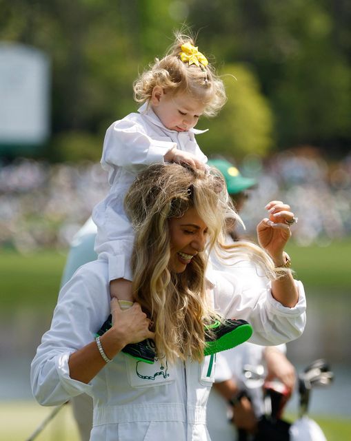 Golf - The Masters - Augusta National Golf Club, Augusta, Georgia, U.S. - April 8, 2026
Wife of Spain's Jon Rahm, Kelley Cahill, with their daughter Alaia Rahm during the par 3 contest REUTERS/Brian Snyder