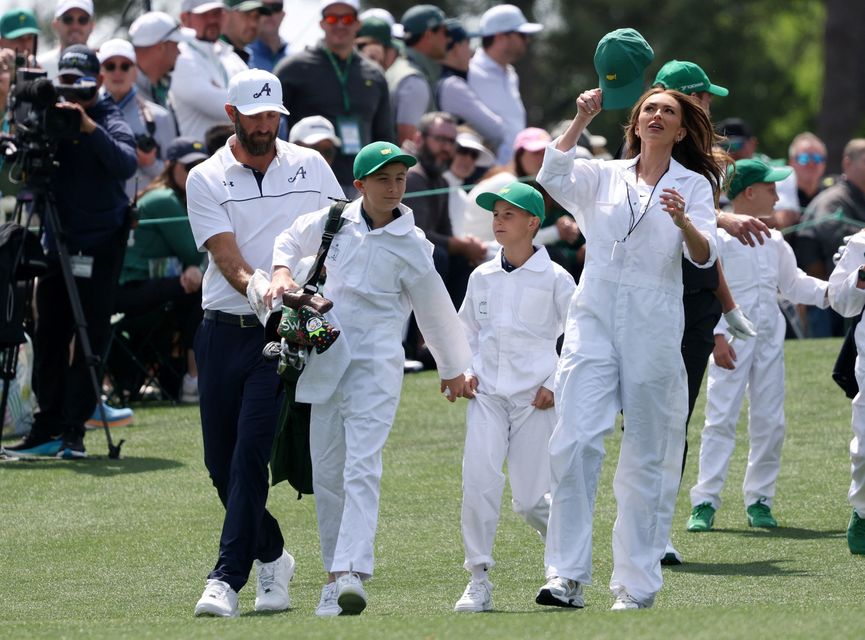 Golf - The Masters - Augusta National Golf Club, Augusta, Georgia, U.S. - April 8, 2026
Dustin Johnson of the U.S. with his wife Paulina Gretzky and their sons Tatum Johnson and River Johnson during the par 3 contest REUTERS/Mike Segar