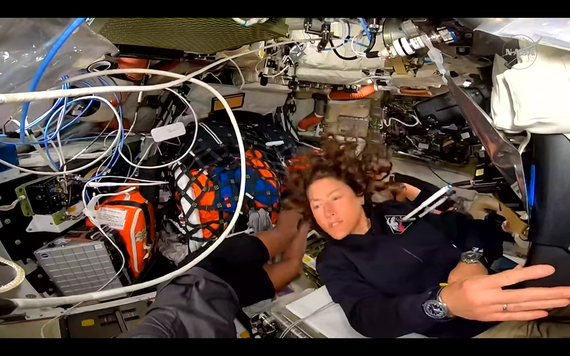 artemis 2 astronauts work inside Orion