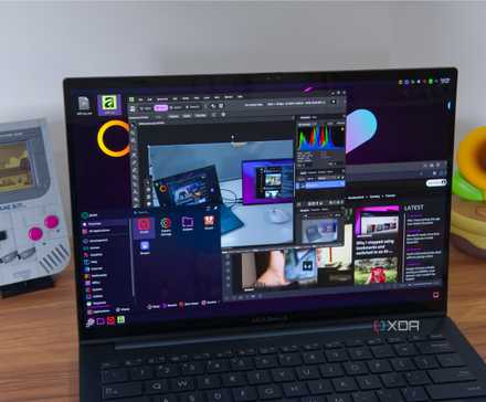 A laptop shwoing the KDE Plasma desktop with apps including Affinity and Vivaldi open