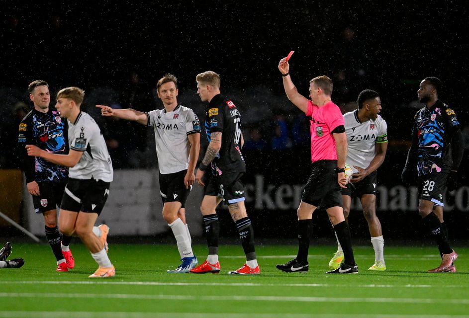 Referee Paul Norton gives James McClean of Derry City a red card (after a second yellow) at Oriel Park. Photo: Paul Phelan/Sportsfile
