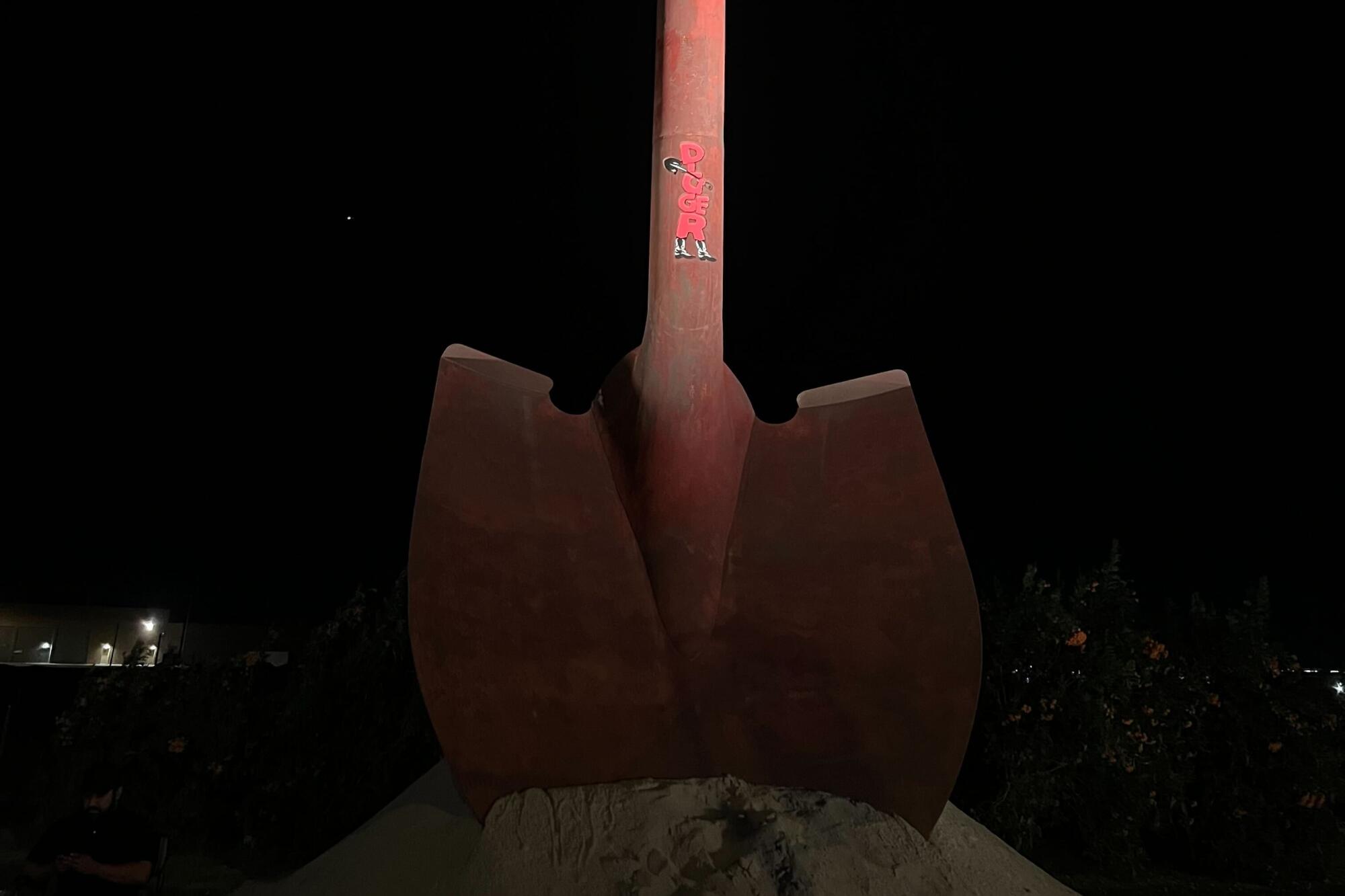 A roughly 40 foot tall shovel promoting Tom Cruise's new project is planted near the Coachella festival grounds