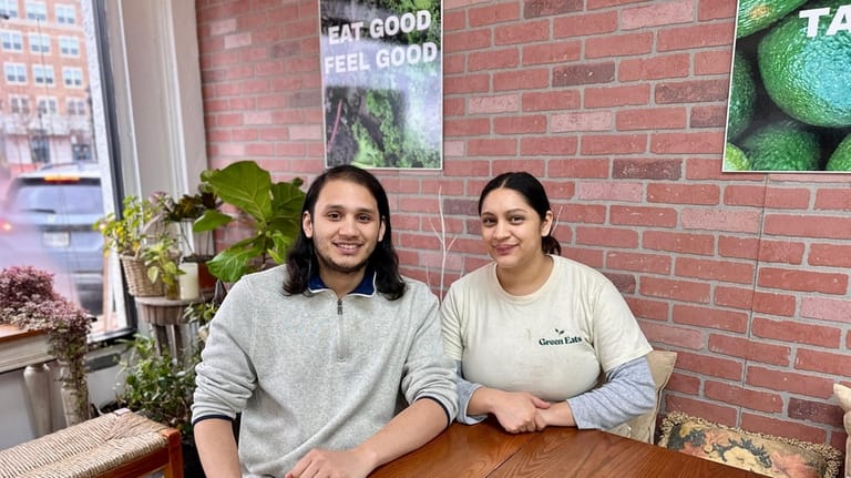 Edward Villatoro, left, and Simone Castillo are the owners of...