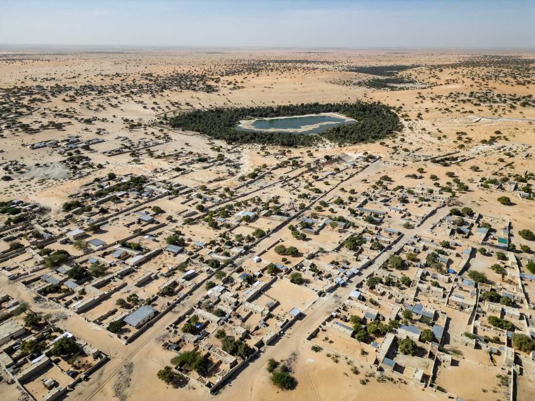 Aerial view of the town of Mao and its oasis in Kanem province, Chad. Such oases proivide crucial arable land for nearby communities, yet elders say they are disappearing in the face of hotter temperatures and stronger winds.