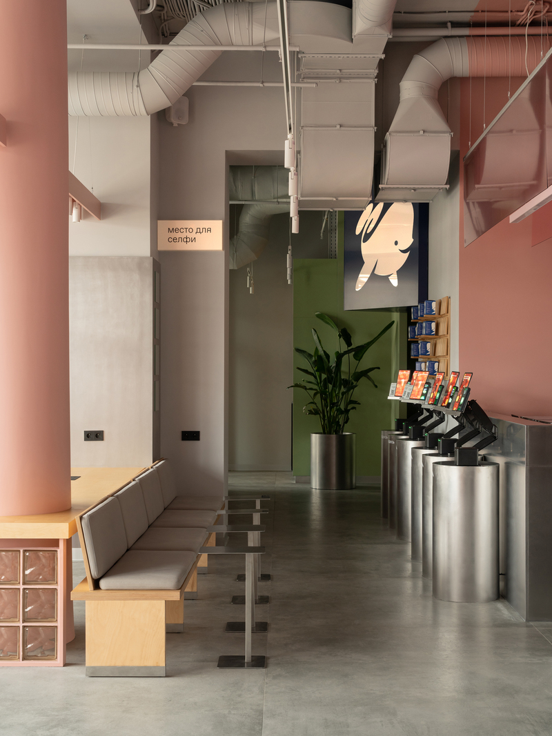 raw concrete meets marshmallow-inspired palette within drinkit flagship café in russia - 8