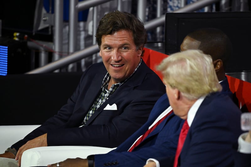 Tucker Carlson, pictured with Donald Trump in 2024, has said he will long be 'tormented' by his role in helping Trump return to the White House. Photograph by Kenny Holston/The New York Times