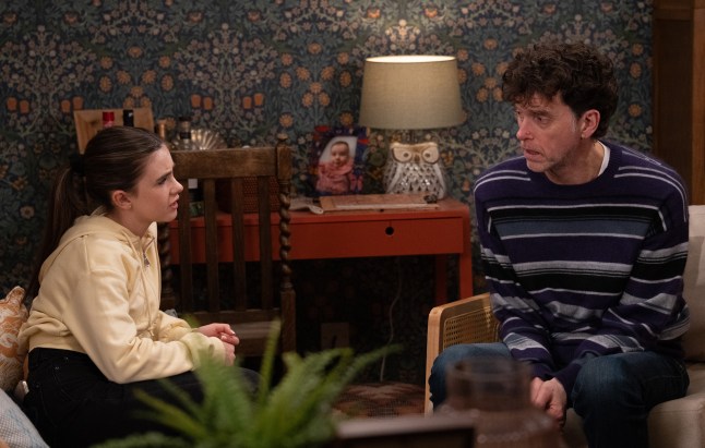 April Windsor and Marlon Dingle sat talking in the cafe