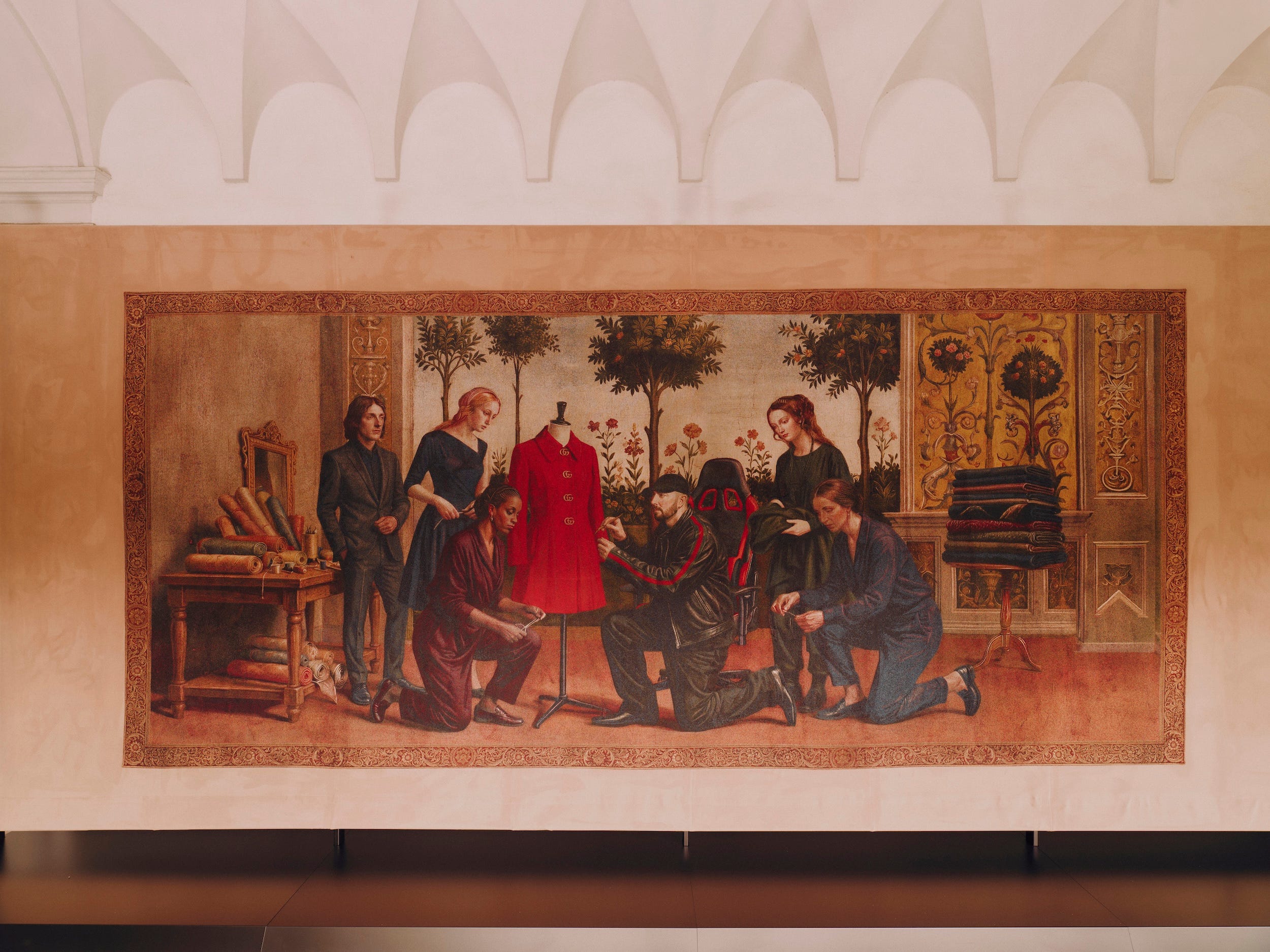 depiction of a group of individuals engaged in fashion design or tailoring activity