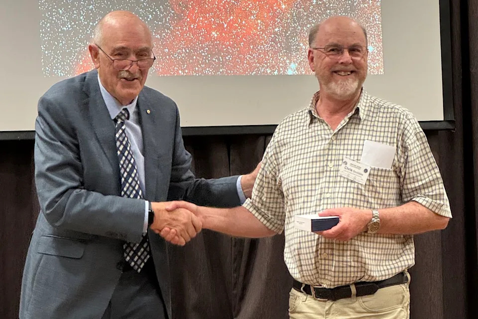 Chris Stockdale (right) receiving his honor.Credit: Courtesy of Science in Public