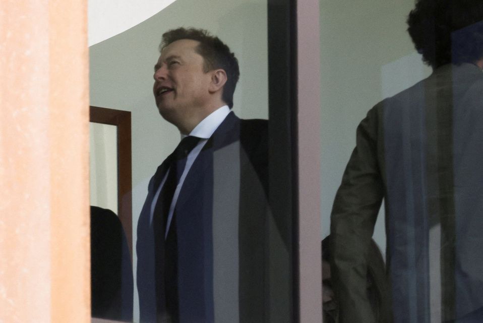 Elon Musk reacts at a federal courthouse during a recess of the trial in his lawsuit over OpenAI for-profit conversion, in Oakland, California, U.S., April 28, 2026. REUTERS/Manuel Orbegozo