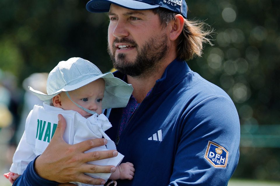 Golf - The Masters - Augusta National Golf Club, Augusta, Georgia, U.S. - April 8, 2026
Andrew Novak of the U.S. with his daughter during the par 3 contest REUTERS/Mike Blake
