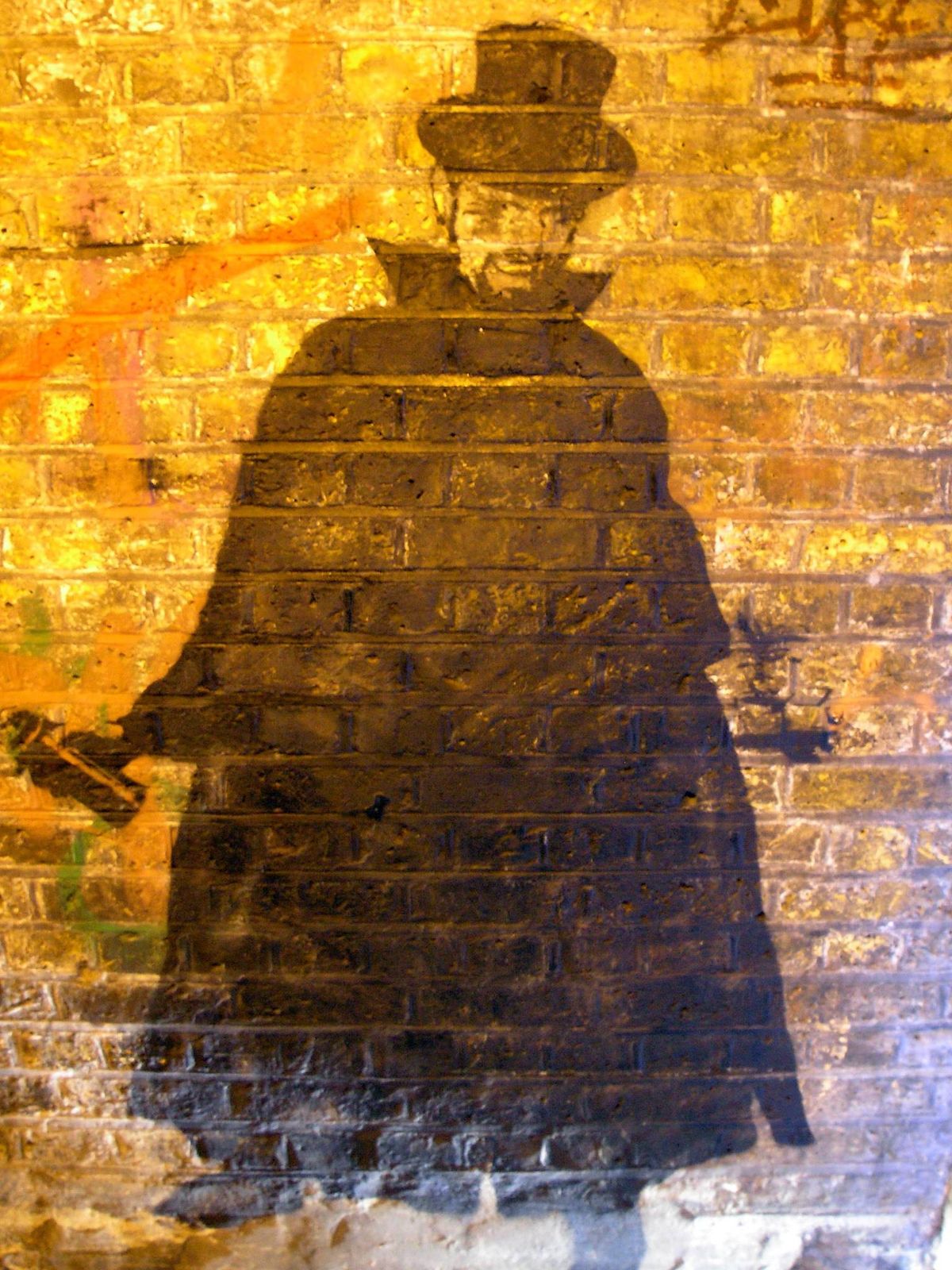 A Jack the Ripper painting on a wall in London's Brick Lane